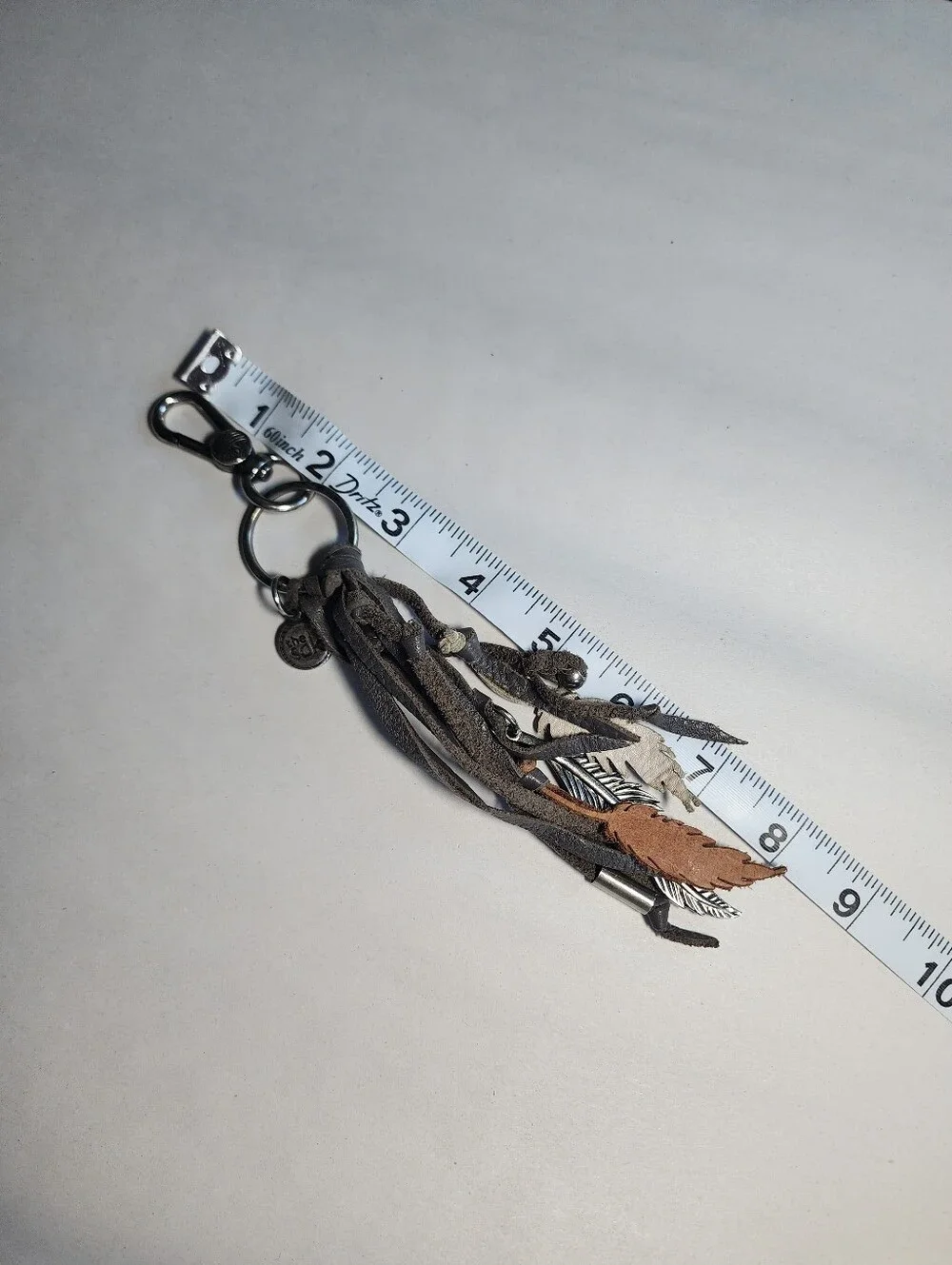 The Sak Leather Feather Tassel Keychain Charm Gray, White & Brown Bohemian
